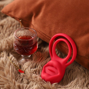 Red penis ring with a pillow and a bottle wine