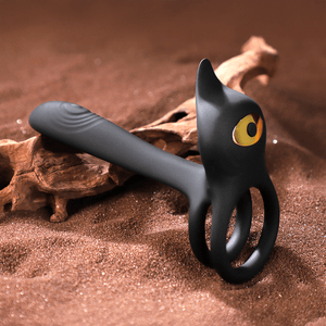 Black cock ring on a brown textured background