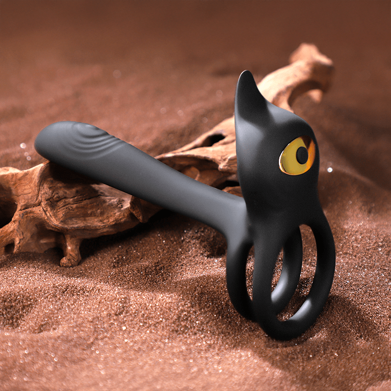 Black cock ring on a brown textured background