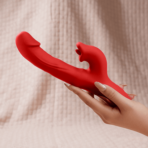A hand hold a red tongue dildo vibrator