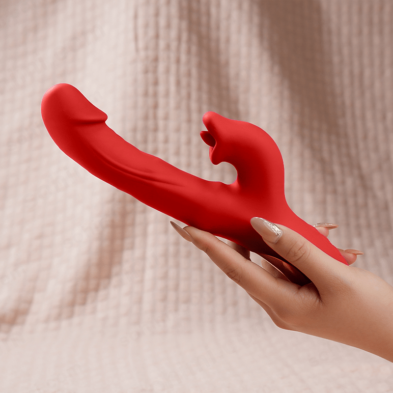 A hand hold a red tongue dildo vibrator