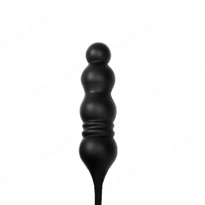 Black toy with multiple rounded ends on a green background with 'sohimi.com' text.