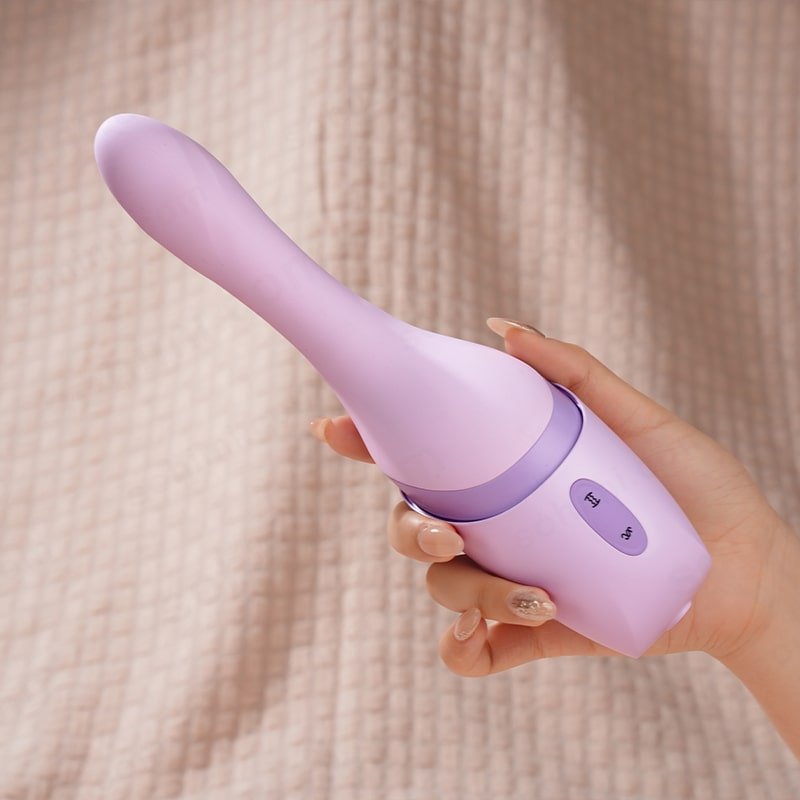 a hand hold a Thrusting and Vibration G - Spot Vibrator