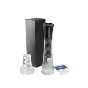 Black and clear man sex toy with packaging and accessories on a green background with 'sohimi.com' branding.