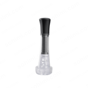 Transparent penis pump with black top on a green background with 'sohimi.com' text.