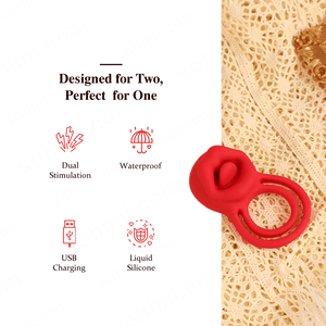 Red silicone ring with text on a green and beige background