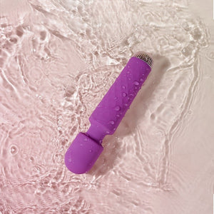 Purple wand vibrator with water