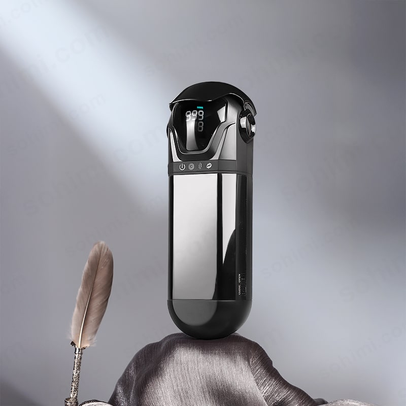 Black electronic device with digital display on a gray background