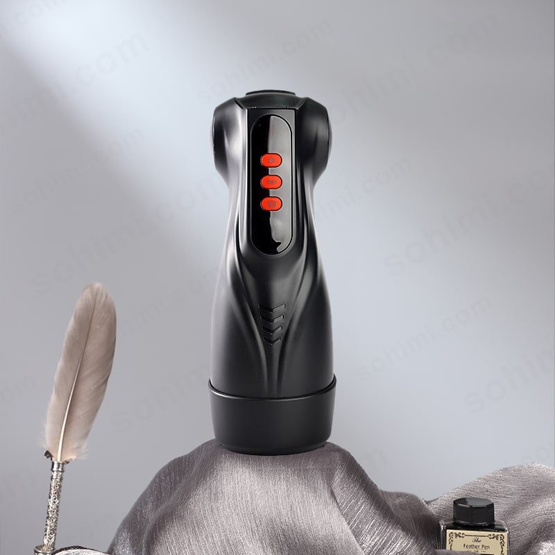 Black electronic device with red lights on a gray surface