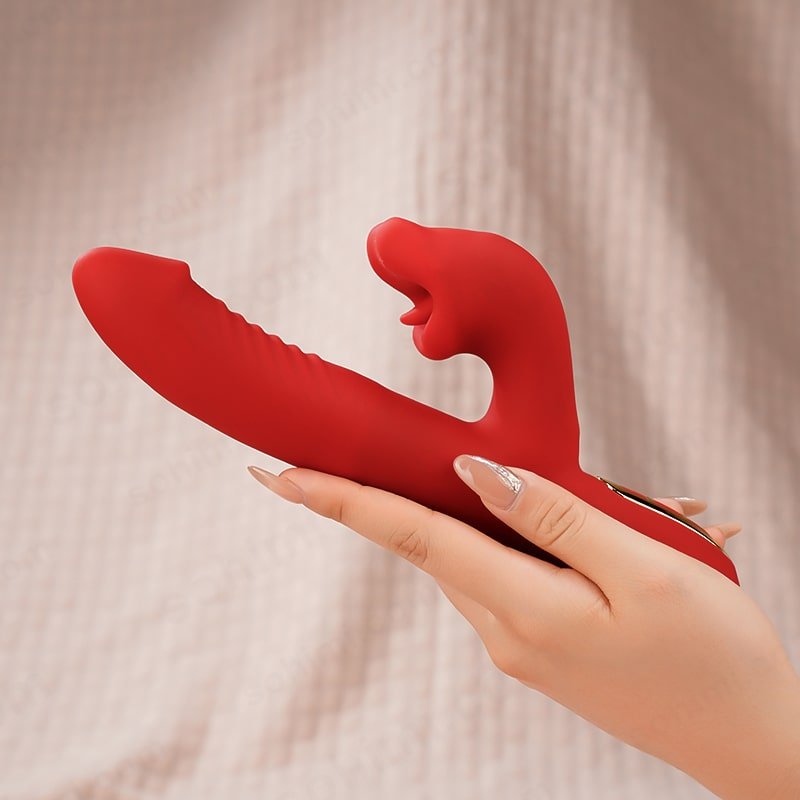 a hand hold a red tongue G-spot vibrator