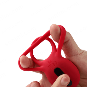 Red silicone ring held by a hand with a transparent background and 'sohimi.com' text.