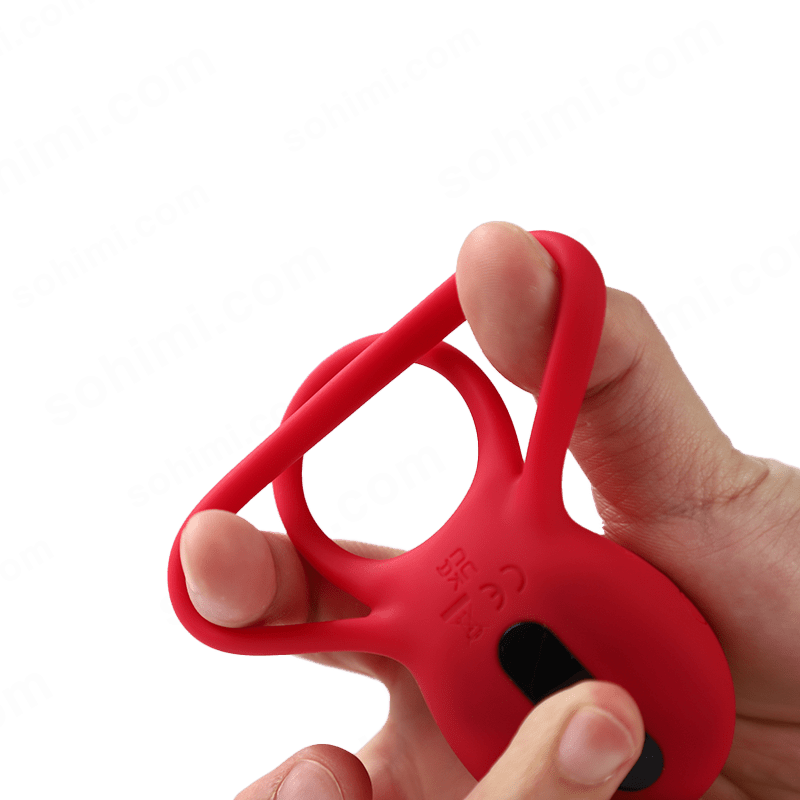 Red silicone ring held by a hand with a transparent background and 'sohimi.com' text.