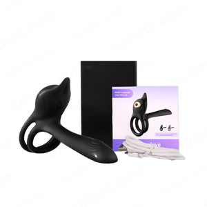 Black sex toy with packaging and remote control on a green background 