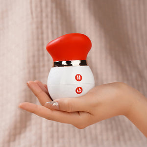 white and red tongue sex toy with a hand