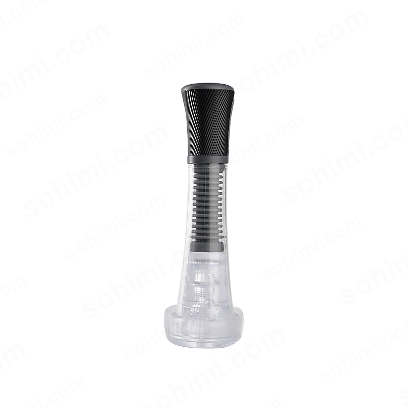 Transparent penis pump with black top on a green background with 'sohimi.com' text.