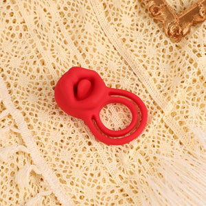 Red silicone ring on a textured beige fabric background