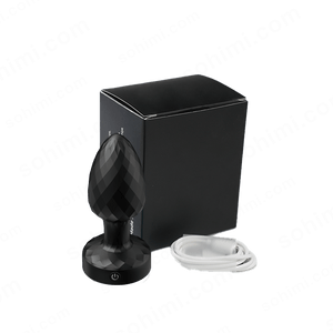 Black silicone sex device with packaging and white cable on a green background with 'sohimi.com' branding.