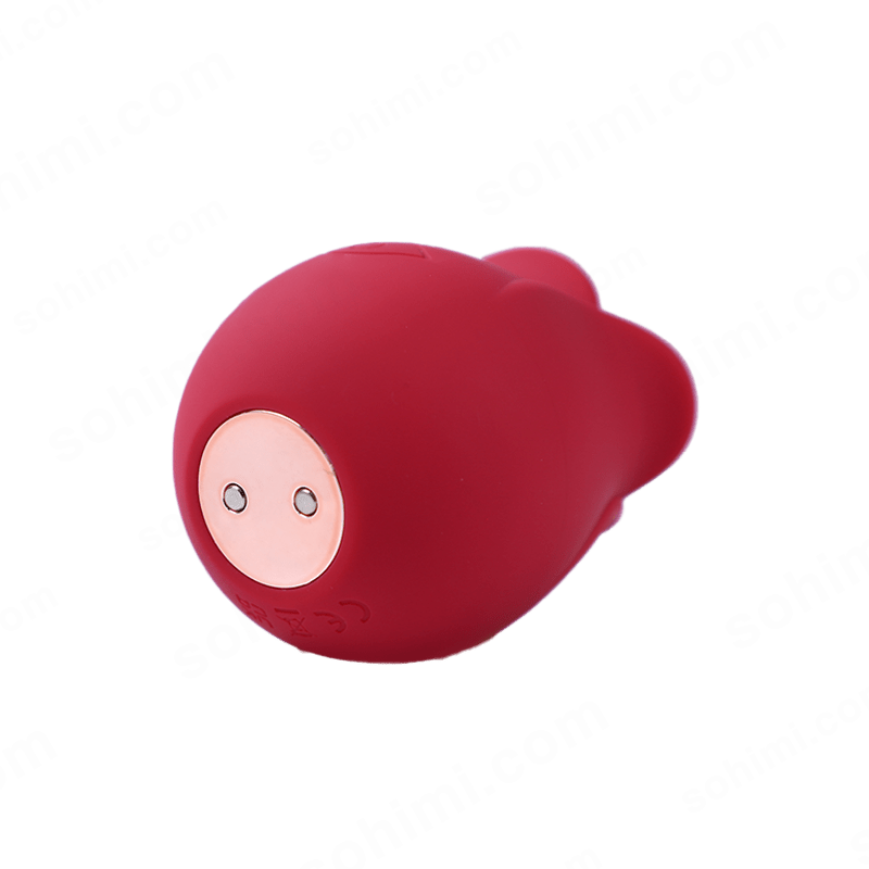 Red plush toy with a pink face on a green background with 'sohimi.com' text.